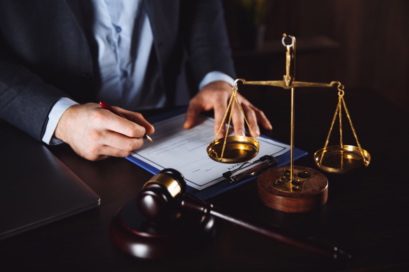 lawyer office statue justice with scales lawyer working laptop scaled ARENAYA FIRM LAW DUBAI